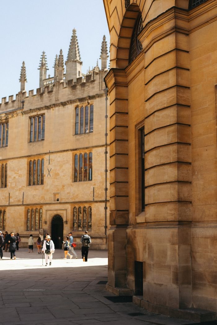 Elegant Oxford architecture captured on a sunny day, highlighting classic university buildings.